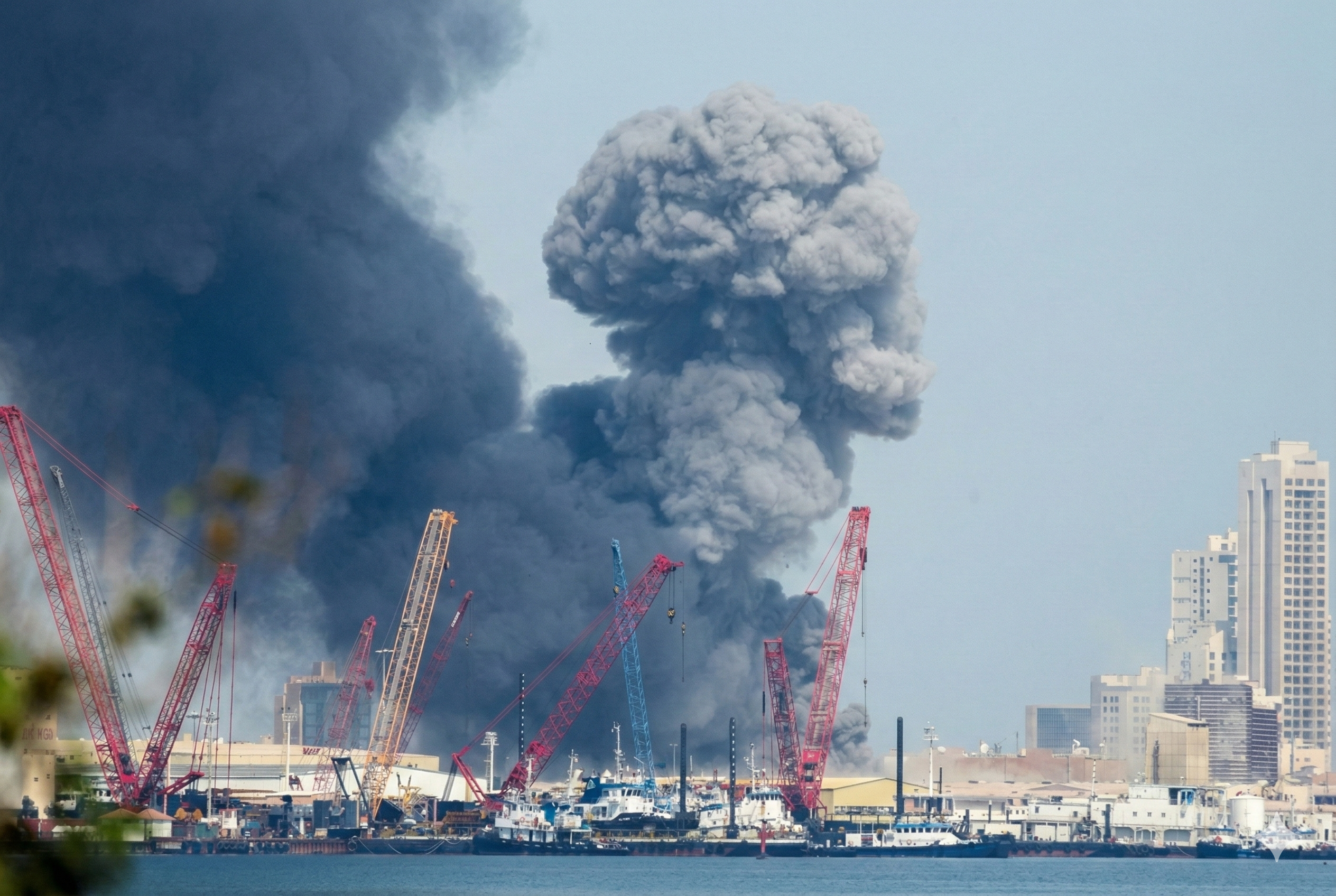 A cloud of smoke and security sirens blare over Abu Dhabi and Bahrain after a missile attack.